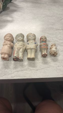 Four Bisque figurines