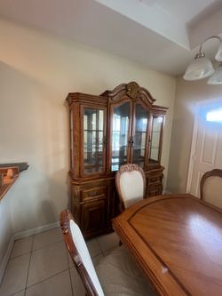 Dinning tables with 8 chairs and China cabinet