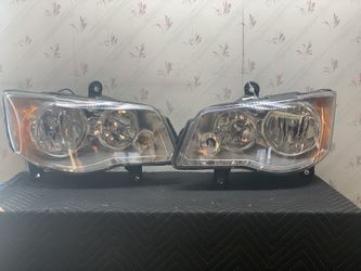 11-19 DODGE CARAVAN HALOGEN PAIR HEADLIGHTS