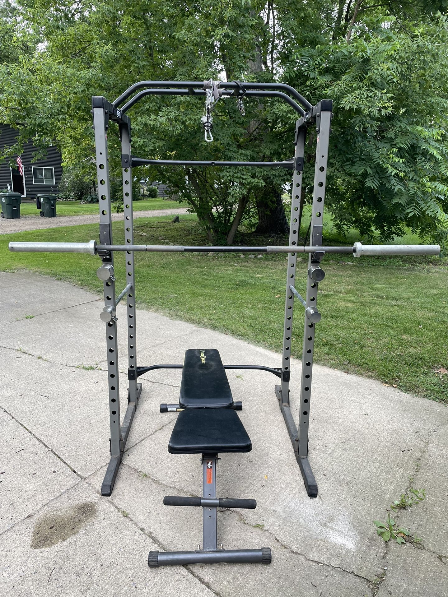 Squat Rack, Adjustable Bench, Barbell, and Accessories
