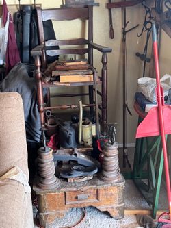 1920 Whitemore’s shoe shine stand and a white more brushes and polish.  polish &