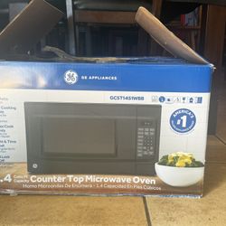 1.6 cu. ft. 1150-Watt Countertop Microwave in Black