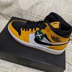 The Air Jordan 1 Mid Taxi  size 9