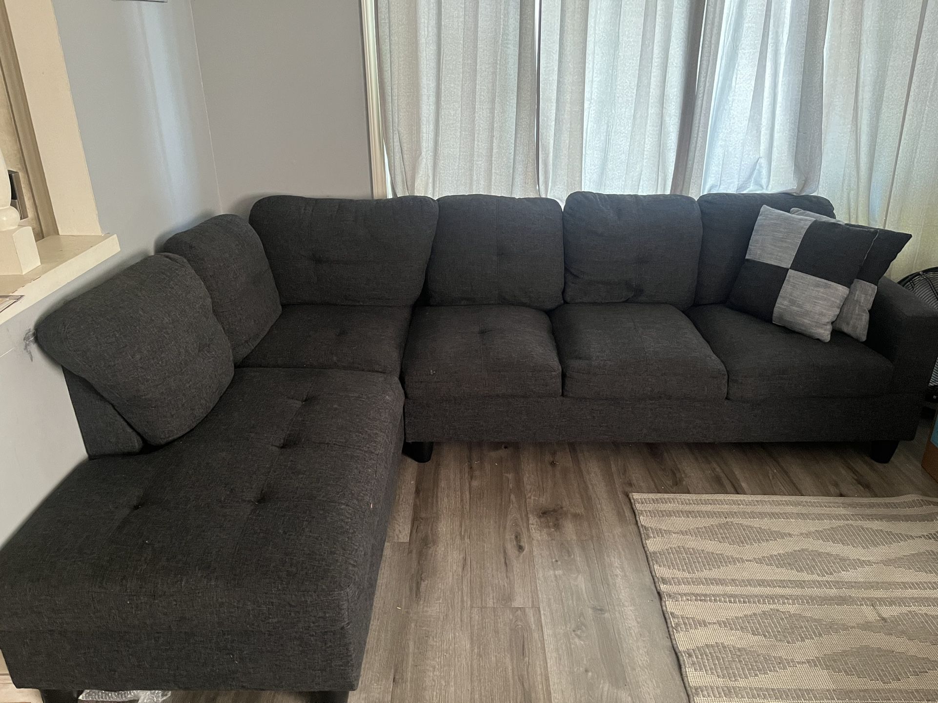 Couch/pillows/ottoman