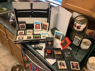 Vintage 1970s and 80s rock and Roll eight track tapes. There are seventeen total including: Ted Nugent Cat Scratch Fever, Boston More Than. A Feeling,