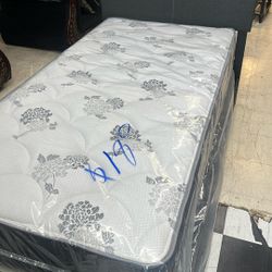 Twin size bed with mattresses
