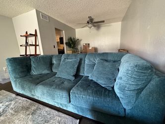 Teal colored couch