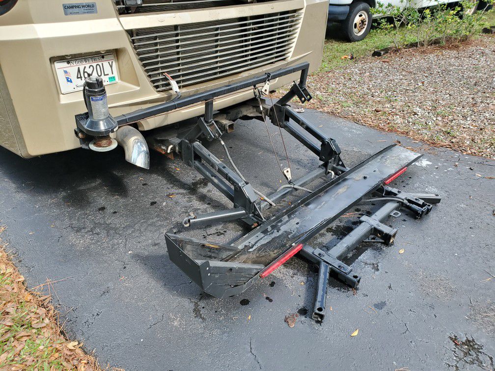 Motorcycle carrier power lift for RV or Camper