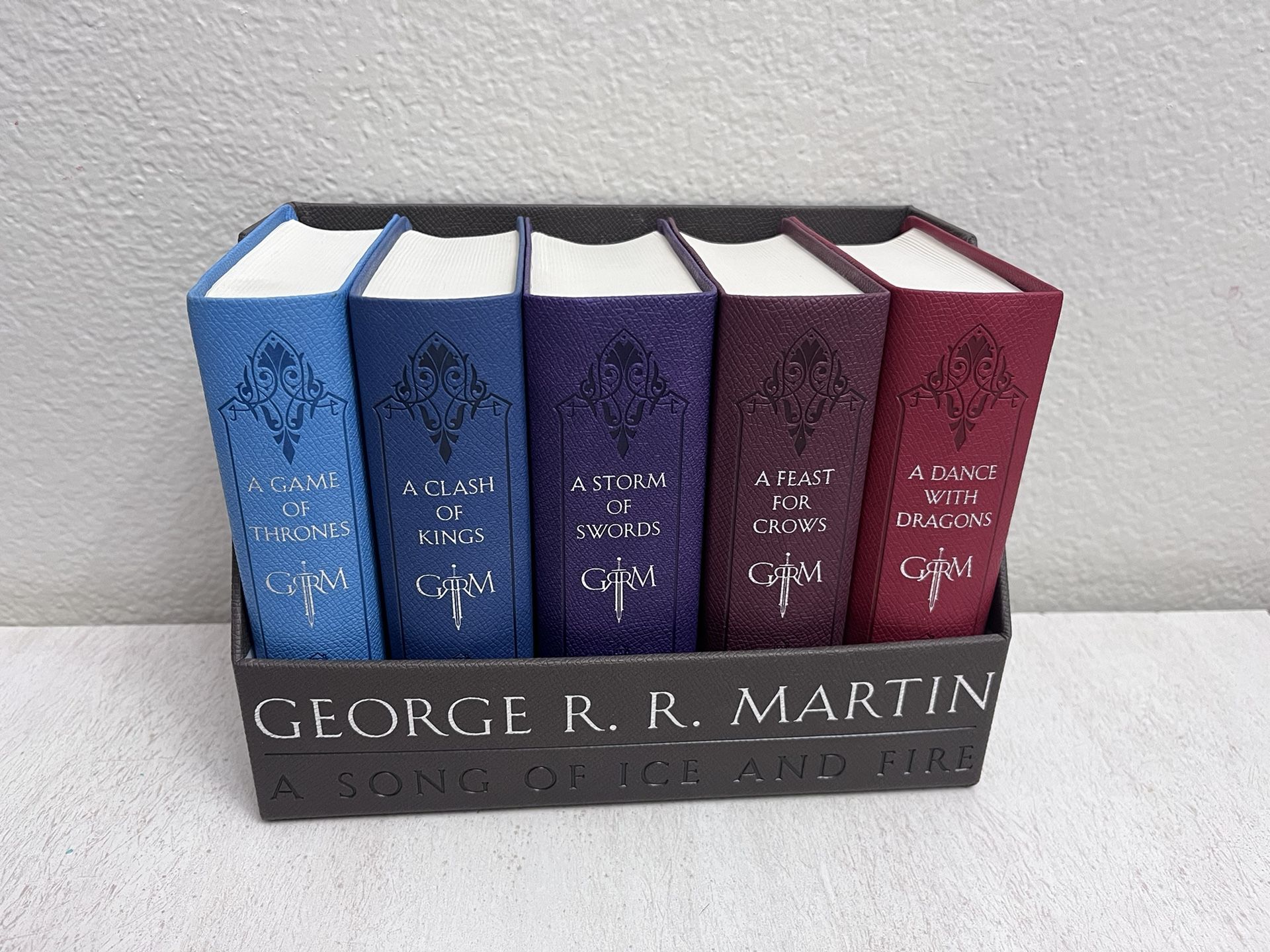 George R. R. Martin's A Game of Thrones Leather-Cloth Boxed Set (Song of Ice and Fire Series): A Game of Thrones, A Clash of Kings, A Storm of Swords,