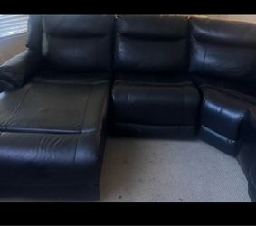 Black Leather Reclining Sectional Sofa with Console and Matching Reclining Chair