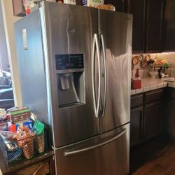 Refrigerator And Dining Table