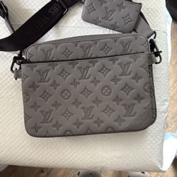 Louis Vuitton Gray Messenger Bag with Monogram Design