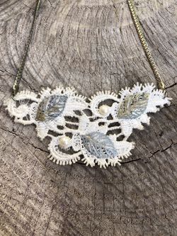 A unique golden lace vintage like pearl beads necklace