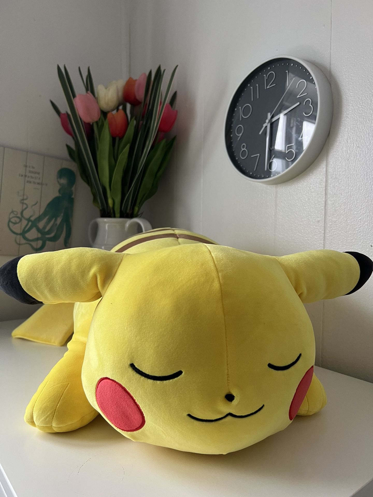 Sleeping Pikachu plush from the Pokémon franchise