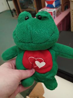 A Green and Red Frog plush toy