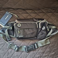 Fanny pack with dog leash.