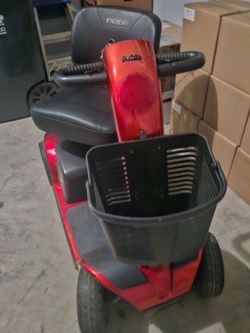 Pride Mobility Scooter Red and lift