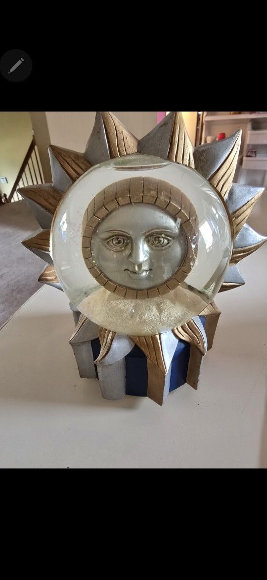 MYSTICAL SUN & MOON SNOW GLOBE SINGS AQUARIUS