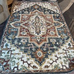 Two matching rugs they cost from $400-$500 each. They are in great condition like new 60 Each  are both For 100