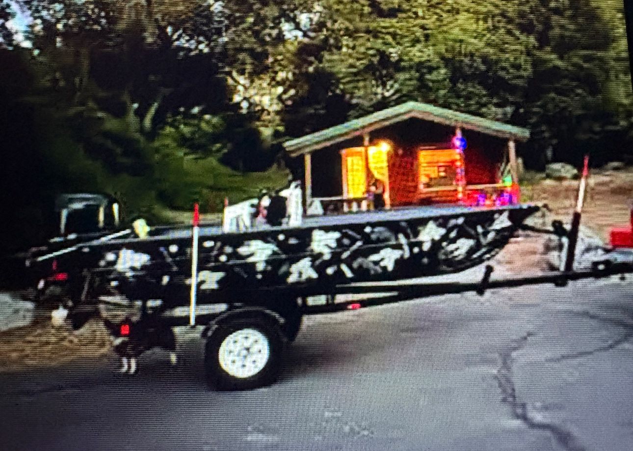 2004 Jon Boat 25 hp Nissan Out board