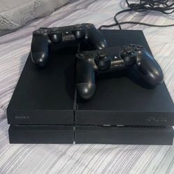 PS4 With Games And Controllers