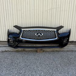 2018 2019 2020 2021 2022 2023 Infiniti Q50 SEDAN front bumper cover used original OEM + CENTER GRILLE WITH CAMERA