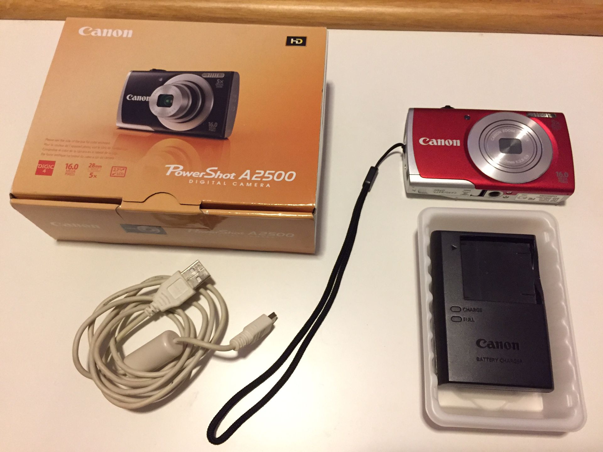 Canon Powershot A2500 with memory card and charger