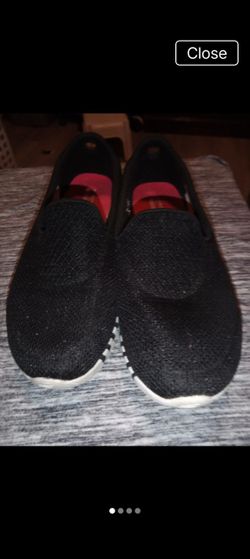 Black Slip-On Sneakers with Red Interior