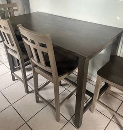 Signature Design by Ashley Caitbrook Rustic Counter Height Dining Table with Storage, Dark Grey with 4 Chairs