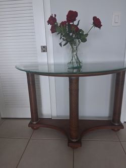 Rounded wooden glass topped accent table