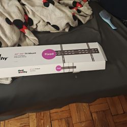 A TV Rack The Holds Up To A 40 To A 90 In TV On Wall