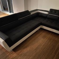New black and white sectional with free delivery