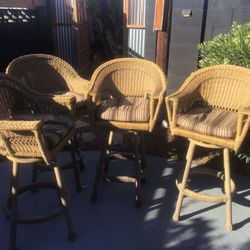 4 Swivel Wicker Chairs