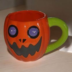 Cracker Barrel Halloween Pumpkin Mug, small chip on inside rim