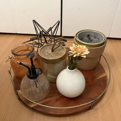 Various home decor items, plant pots and wood tray