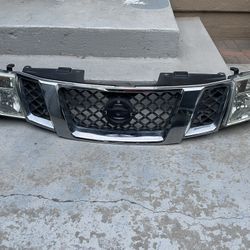 Nissan Frontier Headlights  And Grill OEM  2005 2006 2007 2008 Patfinder 2005- 2012