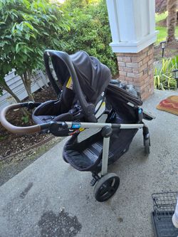 Graco Double Stroller With Infant Car Seat and Base.