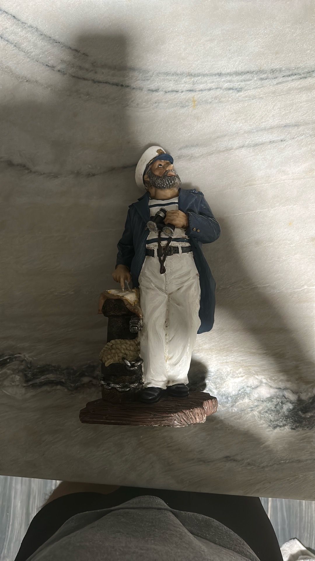 Collector captain statue