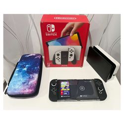 Nintendo Switch OLED with black accessories bundle, screen protector, SD Card & Mario Kart 8 Deluxe