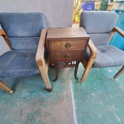 2 Vintage Oak Rolling Chairs With Wooden Night Stand 