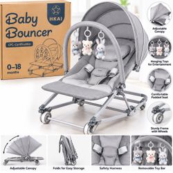 HKAI Baby Bouncer with Canopy & Hanging Toys – New in Box