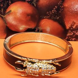 #1982, VINTAGE INSECT  BEETLE BANGLE 1960's CUBIC ZIRCONIA STONES.
