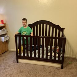 Graco Crib And Two Mattresses 