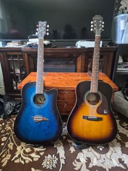 2 guitars. Blue is brand dean. And and other is epiphone