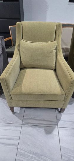 Green Upholstered Accent Chair with Casters