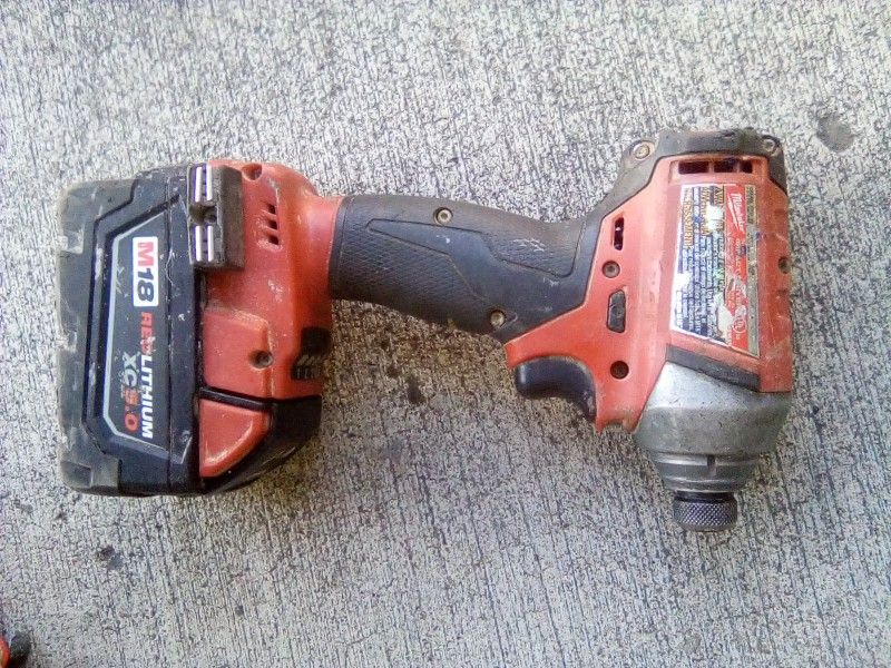 Milwaukee M18 1/4 " Impact Driver And 5 AH battery