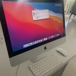 iMac With Keyboard And Mouse