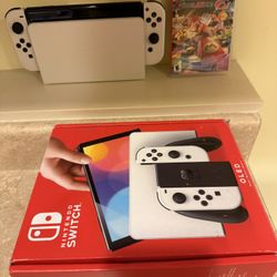 Nintendo Switch OLED Edition + Game
