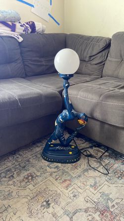 Blue Figurine Floor Lamp with Globe Shade