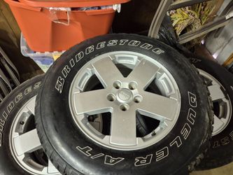 Bridgestone 255/70 r18 tires and rims